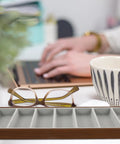Top Shelf Walnut Wooden Sunglasses Tray With Silky Gray Velvet Liner, Roomy Seven Slot Eyewear Display Rack on desk with glasses.