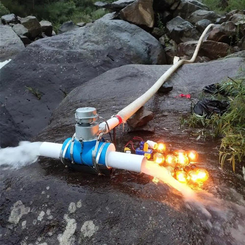 1000W Micro Hydro Generator For Outdoor Use Hydroelectric Water Turbine With 220V Output installed near a stream
