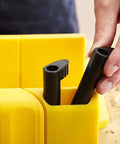 Close-up of yellow Saw Storage Miter Box With Saw Aluminum Construction All In One 11.81 Inch Length With storage slots