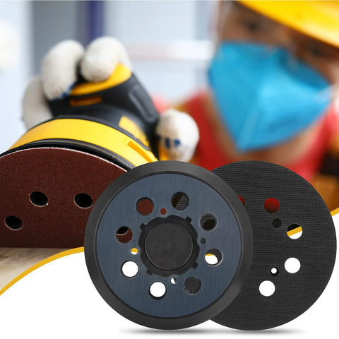 Front view of two 5-inch, 8-hole hook-and-loop sander pads; blue center plate with black backing for DeWalt orbital sanders.