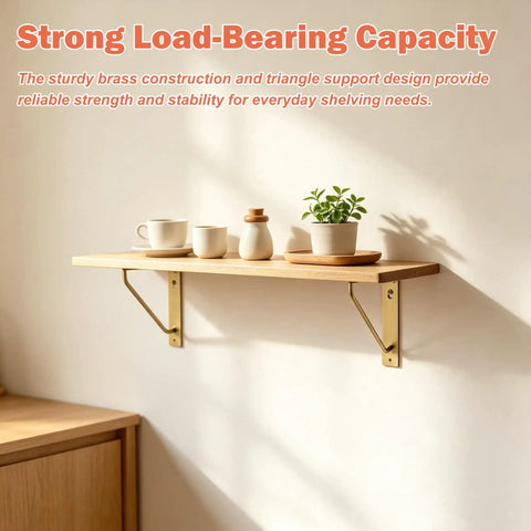 Four Pack Straight Up Premium Solid Gold Brass L Shaped Shelf Brackets With Screws holding a wooden shelf with cups and a plant.