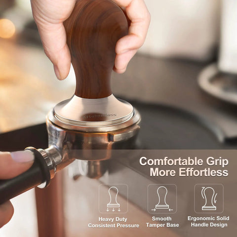 53mm Espresso Tamper With Walnut Handle being used in a portafilter, showing ergonomic design and smooth tamper base