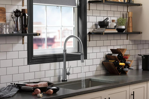 Modern kitchen with Touch2O faucet featuring VoiceIQ Activation Module for Touch2O Kitchen Faucets Compatible with Alexa and Google Assistant.