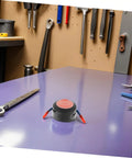 Automatic Aerosol Fire Extinguisher Patch Offering A No Sweat Setup For Quick Flare Zapping On Car Dashboards Wall Outlets And Power Strips on a workbench.