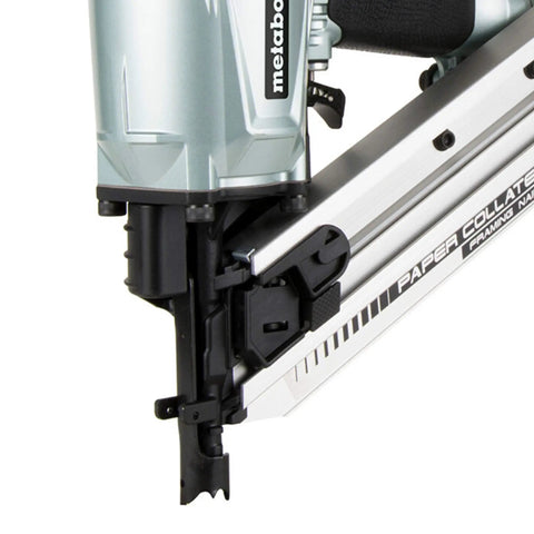 Close-up of metal framing nailer tip, framing nailer for pro builders, lightweight pneumatic power tool for floor wall and roof decking