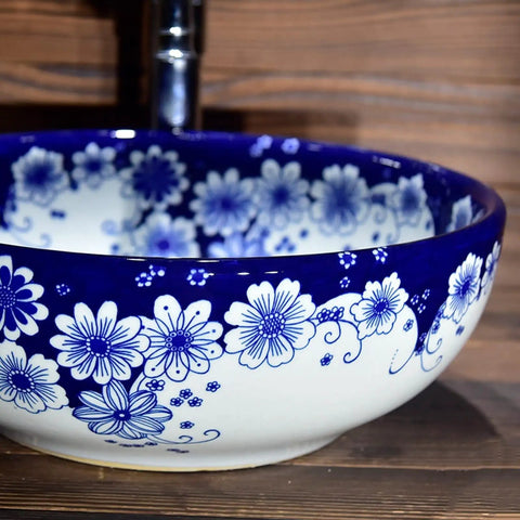 USZWBY Vessel Sinks Blue and White Porcelain Bathroom Basin Sink round ceramic washbasin with floral design.