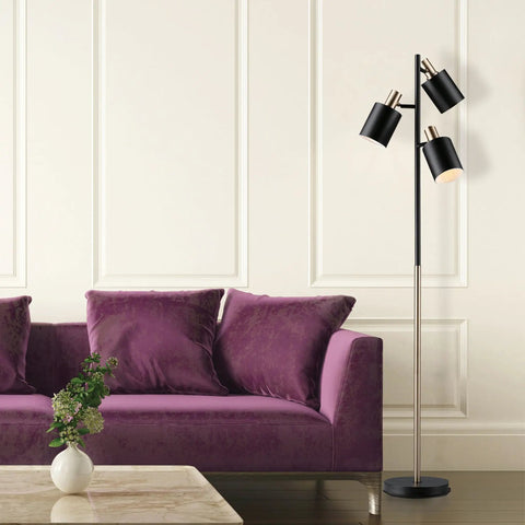 67 Inch 3-Light Tree Floor Lamp with Matte Black Finish and Brass Accents next to purple sofa in living room, showcasing sleek industrial vibe.