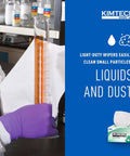 Front view of Kimtech Kimwipes Delicate Task Wipers, white 1-ply; lab scene with gloved hand and graduated cylinder