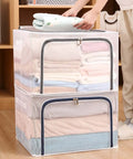 Two clear and gray Huge 80L Foldable Storage Bins Organizer with metal frame and durable handles stacked in a wardrobe setting.