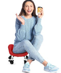 Woman sitting on a red Rolling Stool With Backrest 450 Lbs Weight Capacity PU Leather Seat All-Day Comfort, smiling and holding coffee.