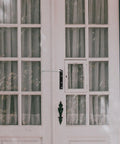 Automatic Silent Door Closer For Gates And Doors, Built-To-Last Stainless Steel, on white wooden door with glass panels