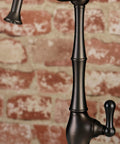 Close-up of Heritage Water Filtration Faucet in oil rubbed bronze, showcasing solid brass construction and finish detail.