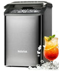 Chewable Nugget Ice Maker For Countertop Cranks Out 40 Lbs Per Day Of Soft Pellet Ice In 10 Minutes Self Cleaning Sonic Ice Machine For Home Kitchen And Office Black Stainless with drink and ice cubes visible