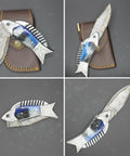 Fish Style Folding Knife with Ladder Pattern Damascus Blade and Blue Resin Handle, Brass Engraved EDC Knife on leather sheath.