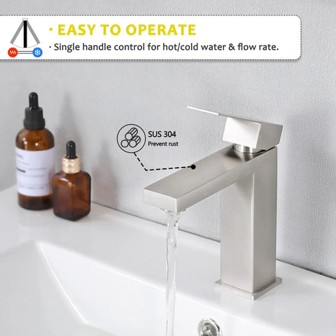 Modern bathroom faucet with single handle, brushed nickel finish, installed on white sink with flowing water.