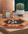 Upgraded Shut The Box Dice Game for 1 to 6 players on wooden board with 16 dice, displayed on table in a cozy home setting.