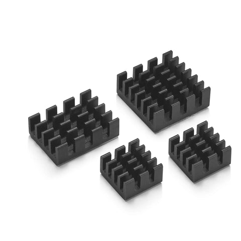 Four black aluminum heat sinks designed for Raspberry Pi 4 Model B cooling included in the starter kit.