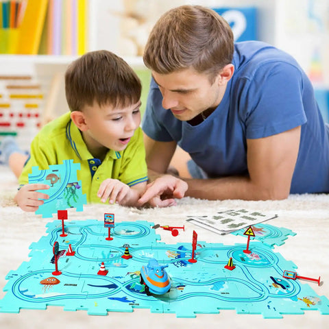 Father and son playing with Ocean Edition Puzzle Track Car Play Set For Kids Ages 3 To 6 With Vehicles And Car Tracks.