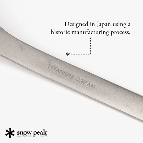 Close-up of Ultra Lightweight Titanium Spork for Outdoors Camping Utensil marked with 'Titanium Japan' engraving.