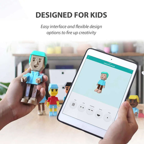 Child holds 3D printed toy and tablet app, Beginner Friendly 3D Printer For Kids With Easy Setup And Safe Design shown in use