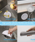 Top Shelf 2 Pack Heavy Duty Silicone Drain Hair Catcher Featuring Rock Solid Suction Cups Sticks Like Glue Stops Hair Clogs Cold And Keeps Your Plumbing Spotless White in a kitchen sink.