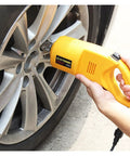 User operating the Beefy Electric Trailer Jack With 2 Ton Capacity And 42 Cm Lift Height on a vehicle wheel.
