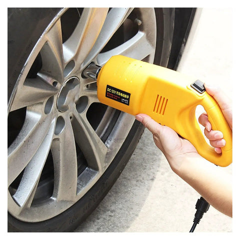 User operating the Beefy Electric Trailer Jack With 2 Ton Capacity And 42 Cm Lift Height on a vehicle wheel.