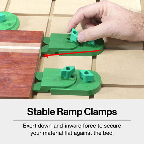 MatchFit CNC Clamping Kit For Woodworking And Milling, 11 Piece Green Set showing ramp clamps securing wood on CNC bed