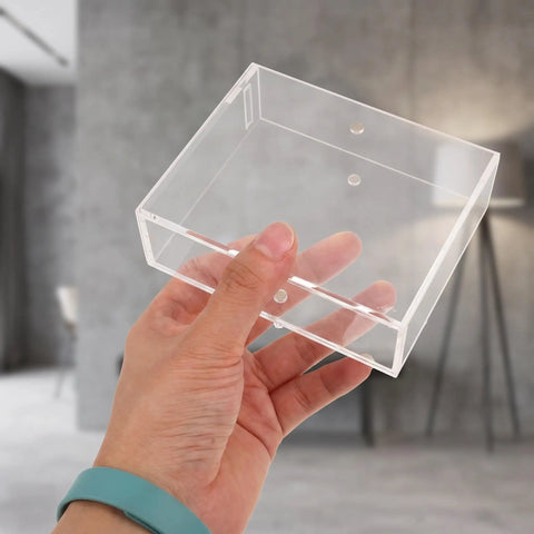 Dual Sided Clear Acrylic Label Roll Dispenser Featuring A Smooth Pull Through Tray Straight Up The Sleek Desktop Organizer held in hand
