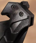 Close-up of handle on Black Serrated Folding Knife With Dual Edge Design for Outdoor Camping, Fishing, and Hunting