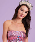 Model wearing Disco Ball Headband For Parties And NYE Fits Adult And Kid Shiny Foil Crown For Birthday Bash Or Holiday Celebration Perfect Disco Bday Decor Hair Accessory.