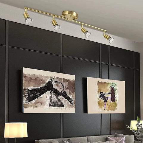 Gold Finish LED 4 Light Track Lighting Kit With Rotatable Heads And Foldable Track Fixtures installed on modern ceiling