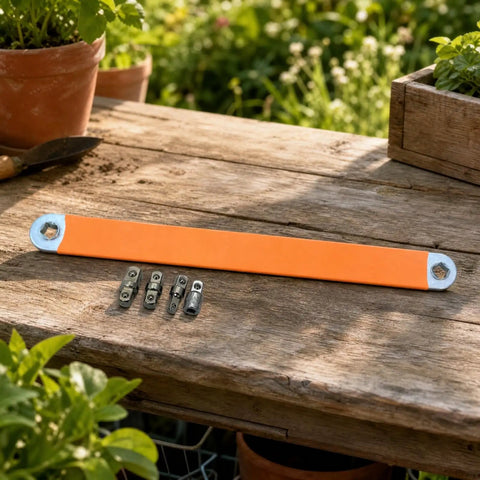Badass Offset Extension Wrench With Swappable Drive Adapters And Quick Socket Attachments Built From Tough High Carbon Steel No Hustle Multi Tool For Cramped Spaces Or Gunked Up Bolts Orange, with a 39 cm handle and interchangeable drives on a wooden surface.