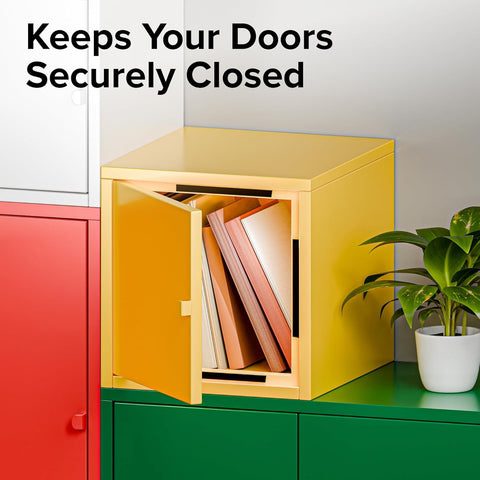 Yellow cabinet with door open displaying books, demonstrating magnetic tape with adhesive backing; plant beside for decor.