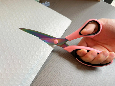Ribbon Scissors Set All Purpose Titanium Blades Stainless Steel Sharp Scissors With Comfort Grip Handles Three Pack Pink And Black For Paper Fabric Crafting And Office Use, pink handle close-up cutting bubble wrap