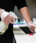 Heavy Duty Clear Vinyl Industrial Gloves Case Of 1000 Units 3 Mil Thick Build Large Roomy Fit used for cleaning with spray bottle.