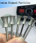 Six Piece Concave Arc Diamond Burr Set Coarse Grit Diamond Mounted Grinding Bits For Bracelet And Ring Making With Rotary Tool And Die Grinder 4mm To 12mm shown in hand