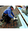 Professional using RN175C 15-Degree Pneumatic Coil Roofing Nailer for quick roofing installations on rooftop.