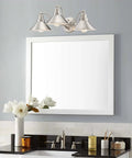 3 Light Modern Farmhouse Vanity Light With Funnel Shades In Brushed Nickel Finish above bathroom mirror and sink