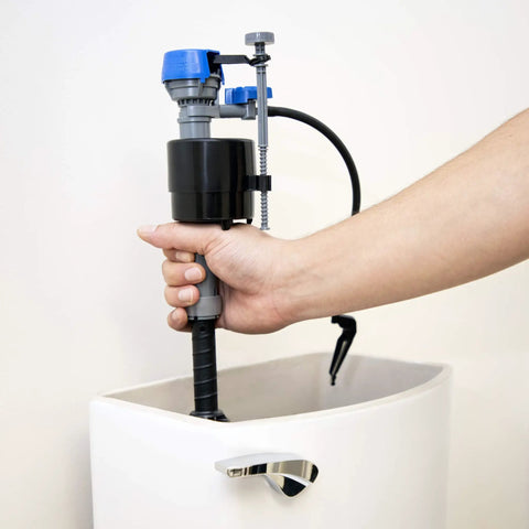 Hand installing Universal Toilet Fill Valve Kit Two Pack Quiet Fast Fill No Fuss Easy Install Adjustable Tank And Bowl Water Levels Fits Most Toilets Reduces Noise And Improves Flush With Clear Step By Step Instructions in toilet tank.