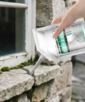 Hand applying Ultra Tough Fast Dry Crack Sealant And Concrete Bonding Agent For Walls And Floors 500ml Repair Glue to stone wall