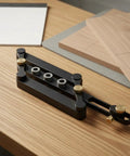 Precision Aluminum Dowel Jig Drill Guide For Smooth Cabinet Building And Diy Woodworking Joinery With Threaded Bushings on a wooden table.