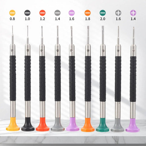 Pro Grade All In One Watch Repair Screwdriver Set With 9 Precision Slotted And Phillips Bits displayed on a marble surface