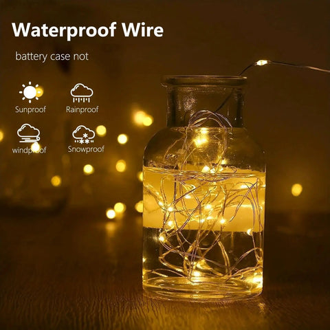 Battery Operated Fairy Lights With Timer Waterproof 16 Foot 50 LED String Lights Indoors Outdoors in glass jar warm white