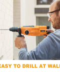 Person using 3 In 1 Rotary Hammer Drill With SDS Plus 1 Inch Chuck 800 Watt Corded Demolition Hammer For Concrete Variable Speed on brick wall