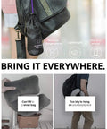 Eggplant Inflatable Pillow With Ergonomic Hug Design For Naps And Lounging, Compact Lightweight Travel Buddy shown with travel bags.
