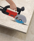 Professional 3000W Corded Circular Saw With Pure Copper Motor And 7000 RPM Water Cooled Wet Dry Cutting Machine cutting through stone.