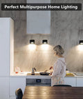 Kitchen with black cordless LED wall lamps illuminating counters, showcasing Cordless Led Wall Lamp For Bedroom With Touch Control Battery Operated Night Light Three Color Temperatures And Three Brightness Levels 360 Degree Rotatable Magnetic Rechargeable Reading Light For Bedroom And Living Room.