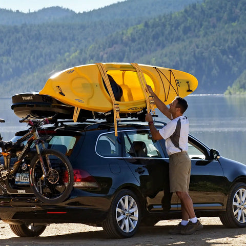 Heavy Duty Four Pack 2 Inch Ratchet Straps With Reinforced Barrels And Double J Hooks For Bulletproof Cargo Tie Downs on kayak atop a black car.
