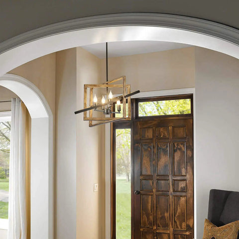 4 Light Rustic Farmhouse Chandelier With Oil Rubbed Bronze Finish hanging in a foyer, viewed from a side angle, wooden door backdrop.